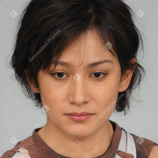 Joyful asian adult female with medium  brown hair and brown eyes