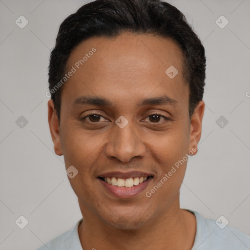 Joyful latino young-adult male with short  black hair and brown eyes