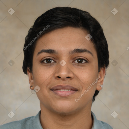 Joyful latino young-adult female with short  black hair and brown eyes