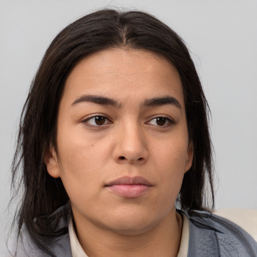 Neutral asian young-adult female with medium  brown hair and brown eyes