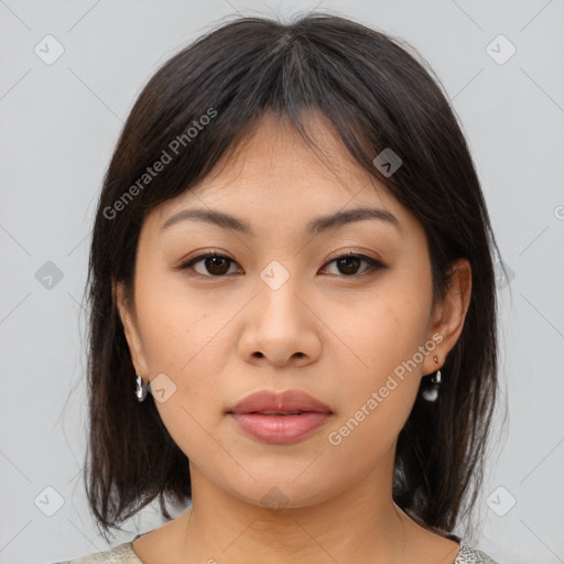 Neutral asian young-adult female with medium  brown hair and brown eyes