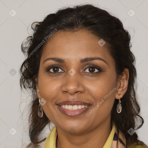 Joyful black adult female with medium  brown hair and brown eyes