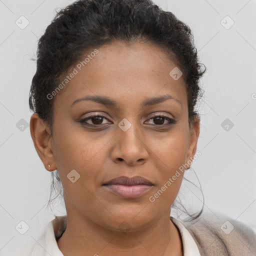 Joyful black young-adult female with short  brown hair and brown eyes