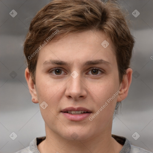 Joyful white young-adult female with short  brown hair and grey eyes