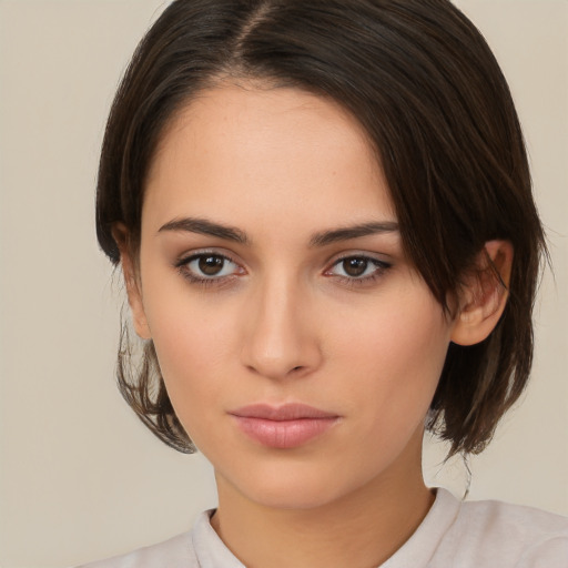 Neutral white young-adult female with medium  brown hair and brown eyes