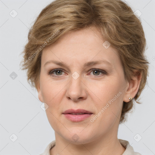 Joyful white adult female with medium  brown hair and grey eyes