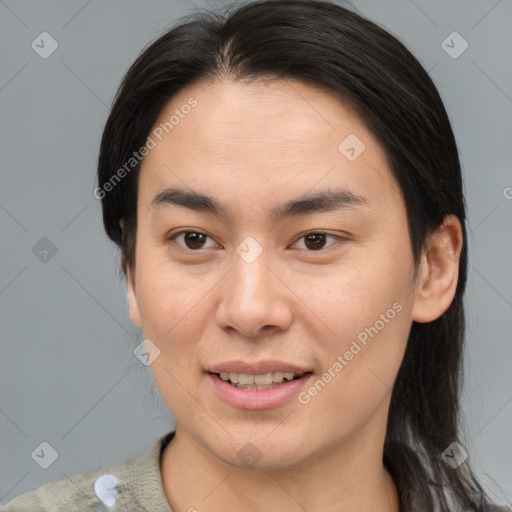 Joyful asian young-adult female with medium  brown hair and brown eyes