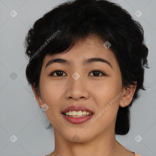 Joyful asian young-adult female with medium  black hair and brown eyes