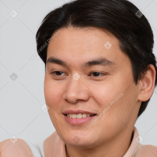 Joyful white young-adult male with short  brown hair and brown eyes