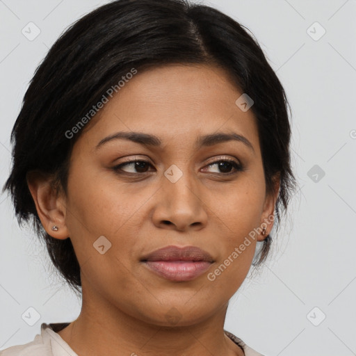 Joyful latino young-adult female with medium  brown hair and brown eyes