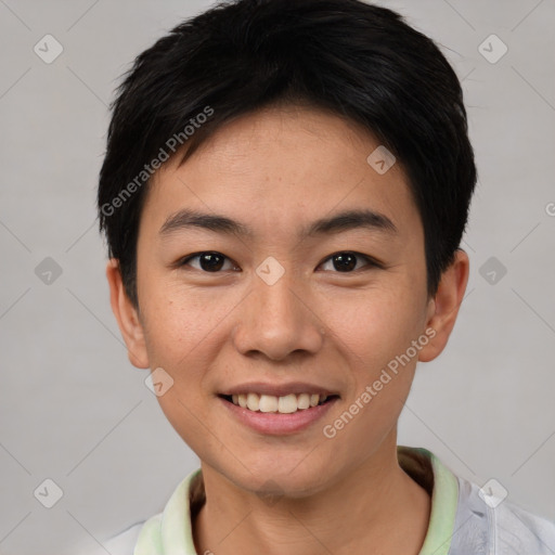 Joyful asian young-adult male with short  black hair and brown eyes