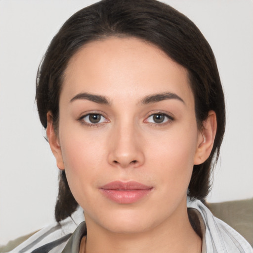 Neutral white young-adult female with medium  brown hair and brown eyes