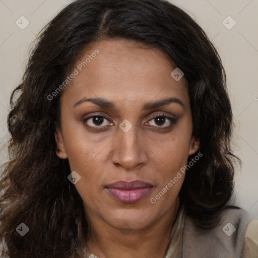 Joyful white adult female with long  brown hair and brown eyes