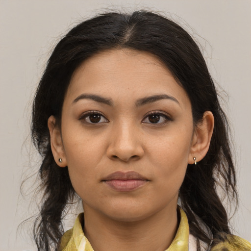 Joyful asian young-adult female with medium  brown hair and brown eyes