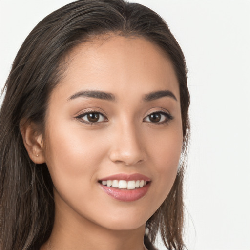 Joyful white young-adult female with long  brown hair and brown eyes