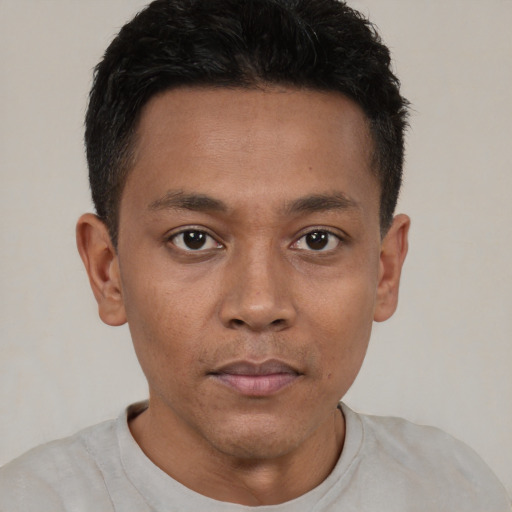 Neutral black young-adult male with short  brown hair and brown eyes