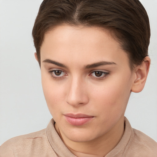 Neutral white young-adult female with short  brown hair and brown eyes