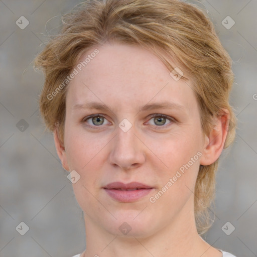 Joyful white young-adult female with medium  brown hair and blue eyes