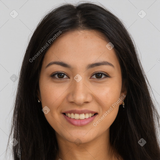 Joyful latino young-adult female with long  brown hair and brown eyes