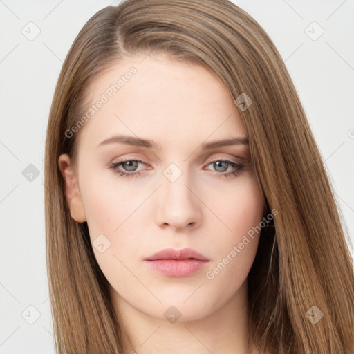 Neutral white young-adult female with long  brown hair and brown eyes