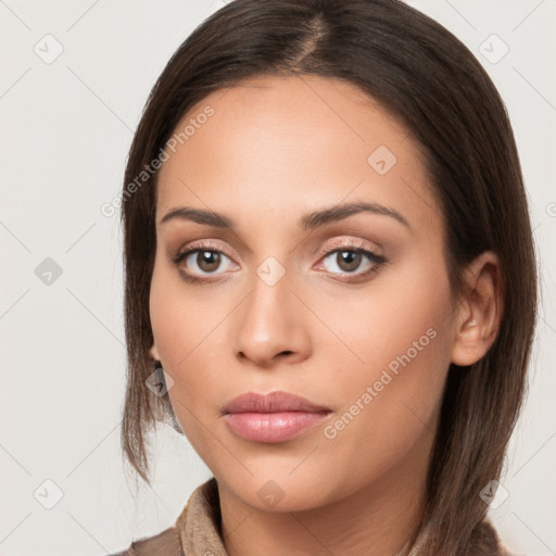 Neutral white young-adult female with long  brown hair and brown eyes