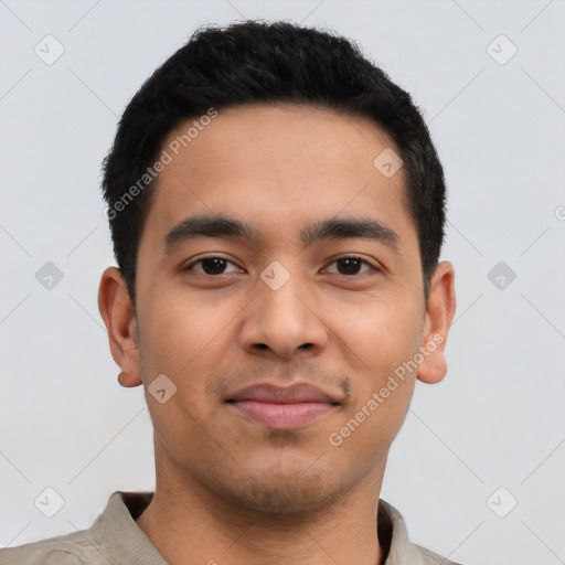 Joyful asian young-adult male with short  black hair and brown eyes