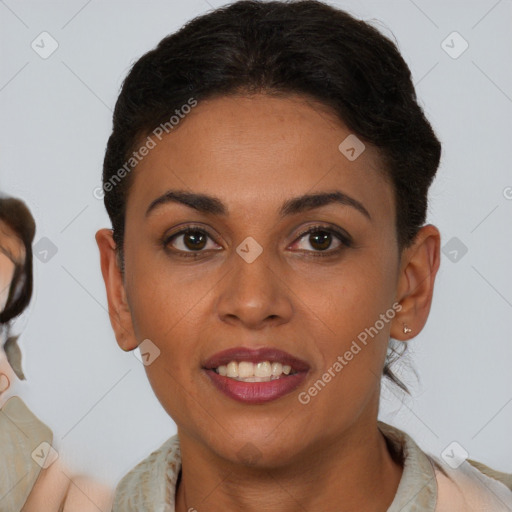 Joyful latino young-adult female with short  brown hair and brown eyes