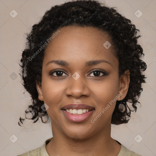 Joyful black young-adult female with medium  black hair and brown eyes