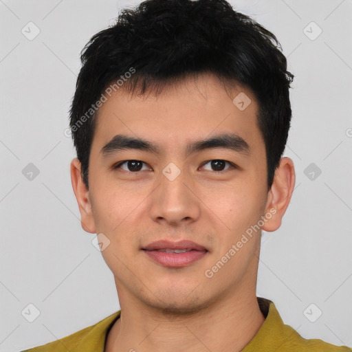 Joyful asian young-adult male with short  black hair and brown eyes