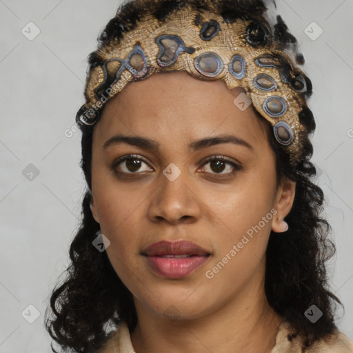 Joyful black young-adult female with long  black hair and brown eyes