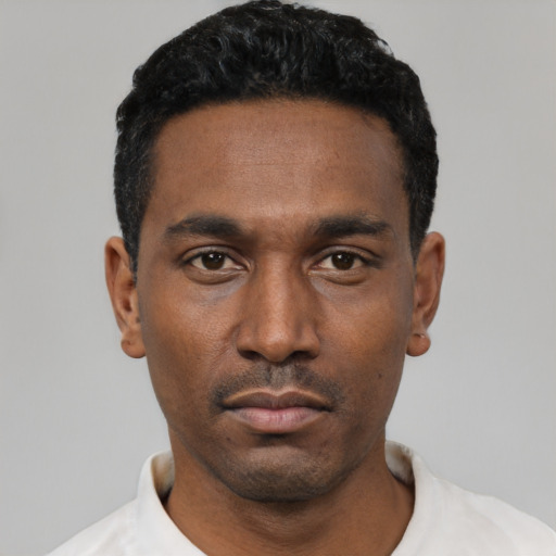 Neutral black young-adult male with short  black hair and brown eyes