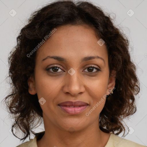 Joyful black young-adult female with medium  brown hair and brown eyes