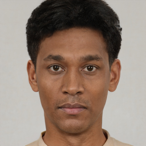 Neutral black young-adult male with short  black hair and brown eyes