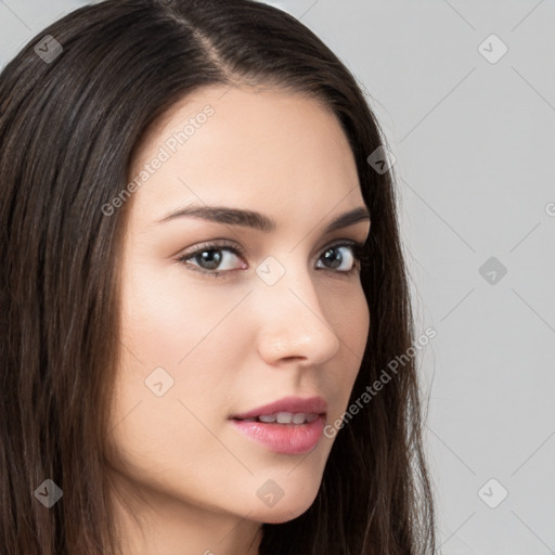 Neutral white young-adult female with long  brown hair and brown eyes