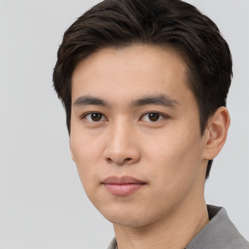 Neutral asian young-adult male with short  black hair and brown eyes