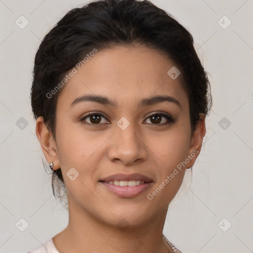 Joyful latino young-adult female with short  brown hair and brown eyes