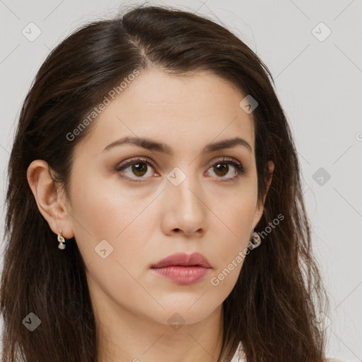 Neutral white young-adult female with long  brown hair and brown eyes