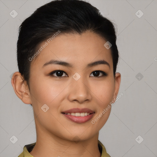 Joyful asian young-adult female with short  black hair and brown eyes