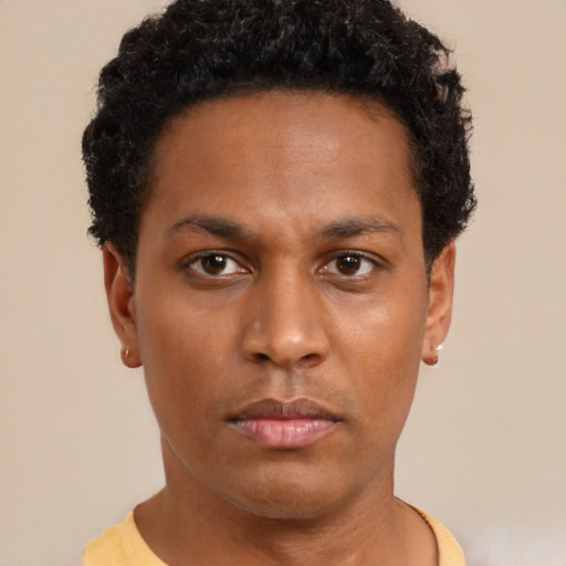 Neutral black young-adult male with short  black hair and brown eyes
