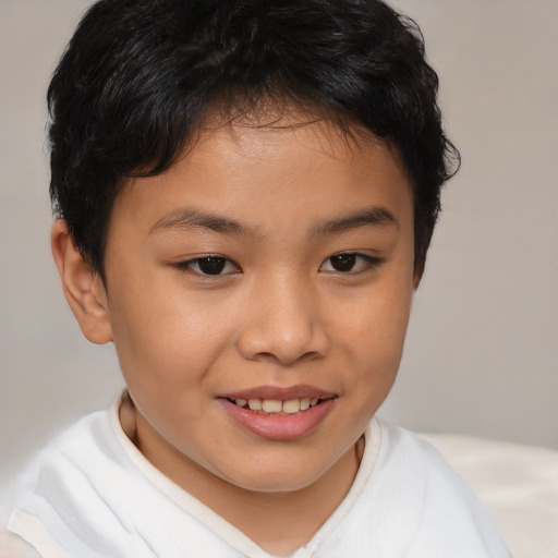 Joyful white child female with short  brown hair and brown eyes