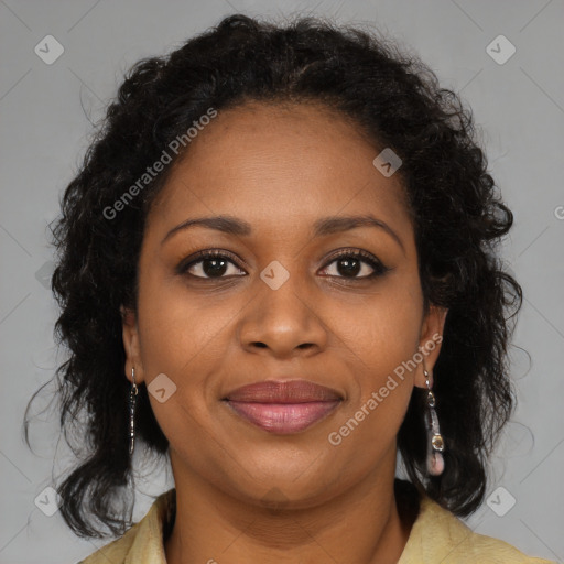 Joyful black young-adult female with long  brown hair and brown eyes