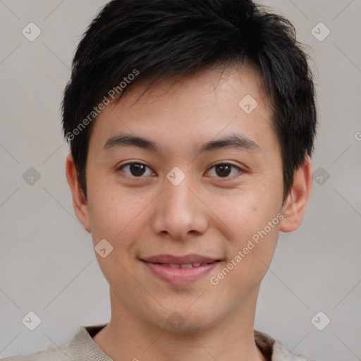 Joyful asian young-adult male with short  brown hair and brown eyes