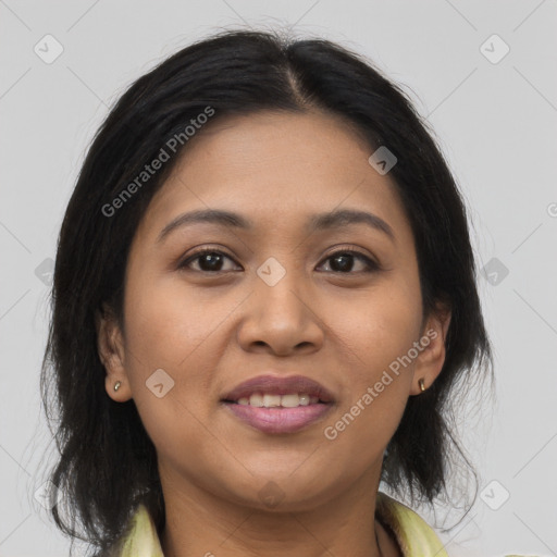 Joyful asian young-adult female with long  brown hair and brown eyes