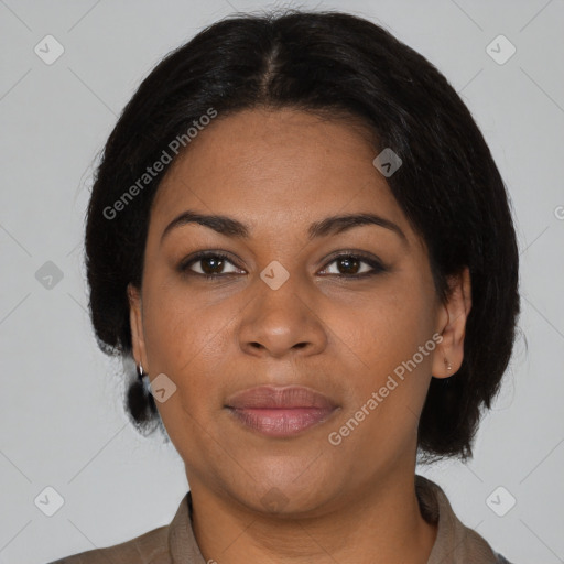 Joyful black young-adult female with medium  black hair and brown eyes