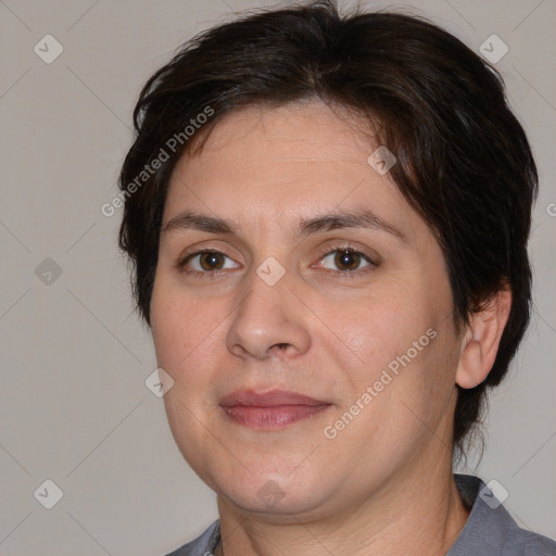 Joyful white adult female with medium  brown hair and brown eyes