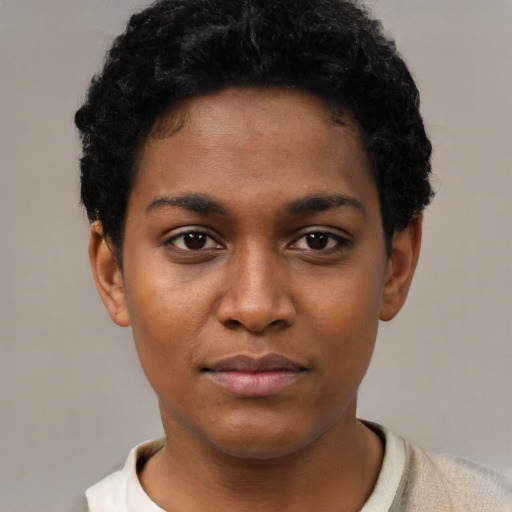 Neutral black young-adult female with short  black hair and brown eyes