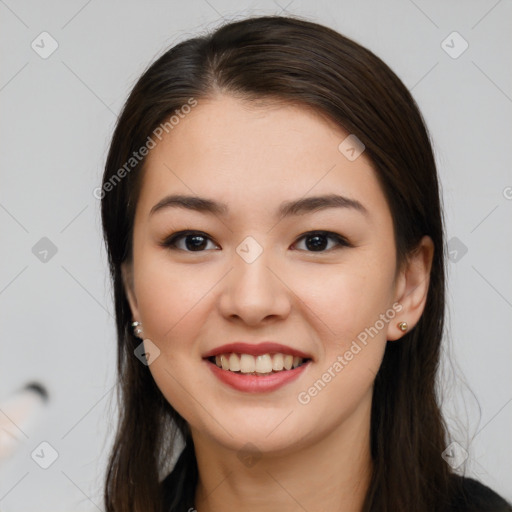 Joyful white young-adult female with long  brown hair and brown eyes