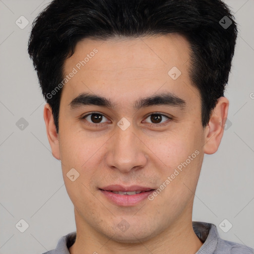 Joyful latino young-adult male with short  brown hair and brown eyes