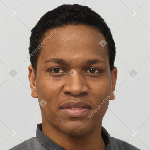 Joyful black young-adult male with short  black hair and brown eyes