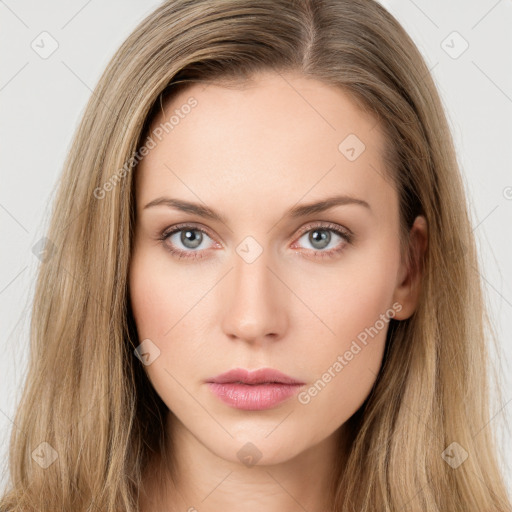 Neutral white young-adult female with long  brown hair and green eyes